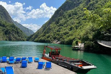 One-day tour from Shkoder to Komani Lake and Shala River, featuring scenic boat rides and crystal-clear waters.