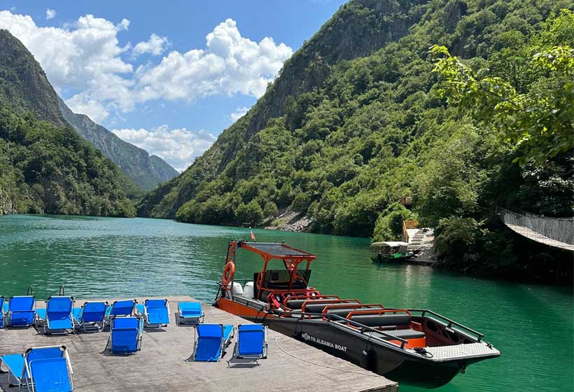 One-day tour from Shkoder to Komani Lake and Shala River, featuring scenic boat rides and crystal-clear waters.