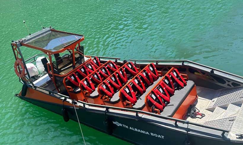 Day trip from Tirana to Komani Lake and Shala River, featuring scenic bus rides and clear turquoise waters.