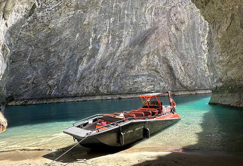 Day trip from Lezhe to Komani Lake and Shala River, showcasing breathtaking landscapes and clear blue waters.